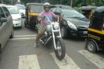 Vishal Dadlani snapped on his bike on a busy road in Mumbai on 22nd Aug 2011 (15).JPG